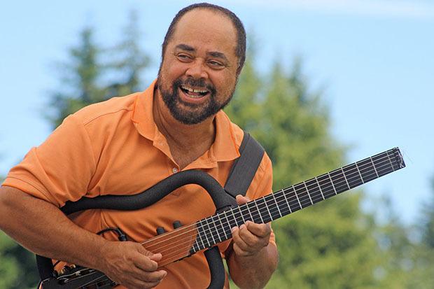 Seattle jazz guitarist Michael Powers performs at the Juneteenth celebration and festival at Morrill Meadows Park on Sunday.