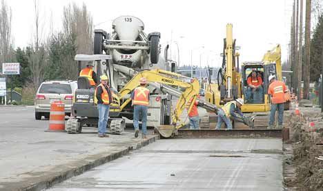RW Scott Construction of Auburn pours the sub-grade concrete mix on Kent's East Valley Highway in January