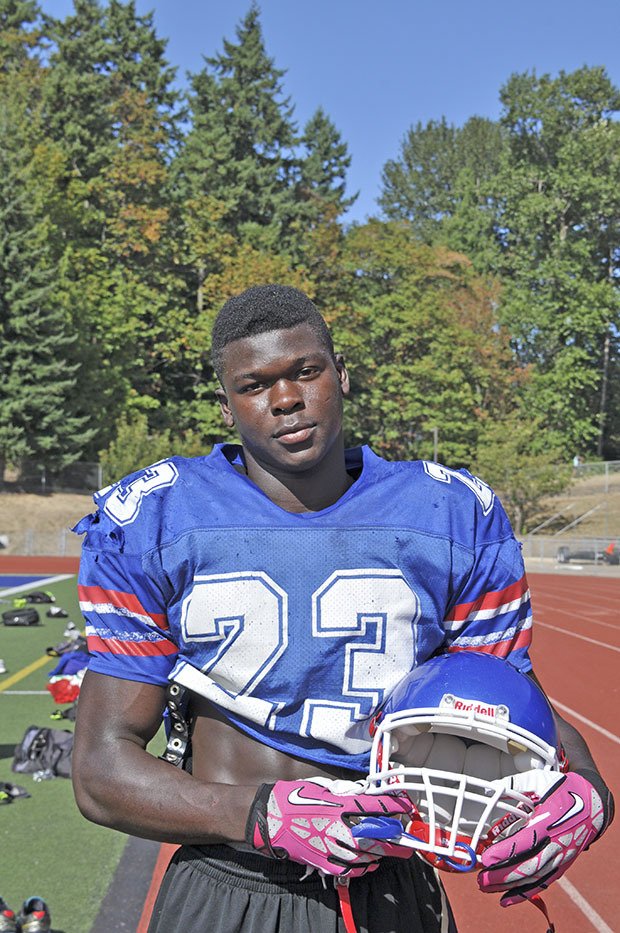 Kent-Meridian High’s Emmanuel Daigbe stars at wide receiver and linebacker for the Royals. He’s also a Class 4A state wrestling champion.