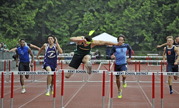 Kentridge’s Tanner Conner leads the field in the 300-meter hurdles at the 4A West Central District meet at French Field last Saturday. Conner