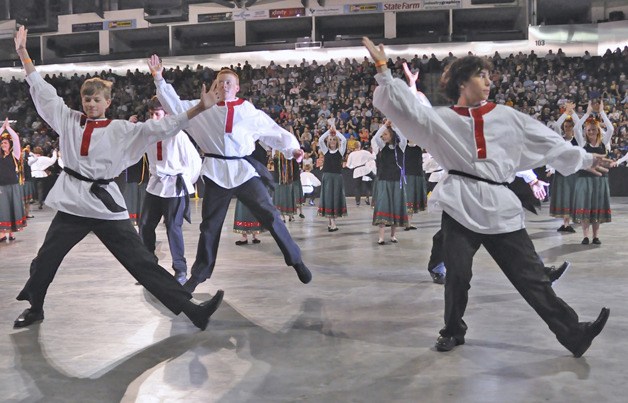 The Kalinka Dance Group from Kent does a routine on the foor at the ShoWare Center.