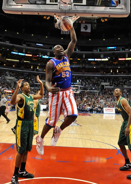Big Easy Lofton delivers a dunk for the Harlem Globetrotters