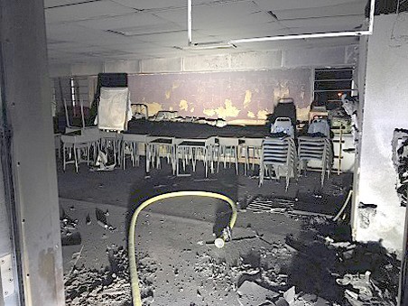 A fire early Tuesday morning heavily damaged a portable at Scenic Hill Elementary School. School is on summer break.
