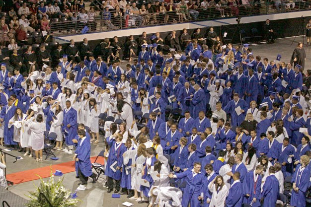 Kent-Meridian High School graduates celebrate in 2010 at the ShoWare Center in Kent.