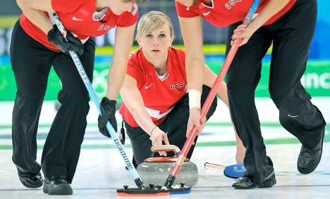 Nicole Joraanstad of Washington State curls with her fellow U.S. teammates during a game against China at the Vancouver Olympic Centre in the 2010 Winter Games Feb. 23.