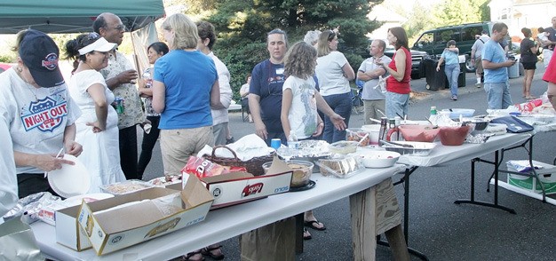 Neighbors gather in Kent during National Night Out last August