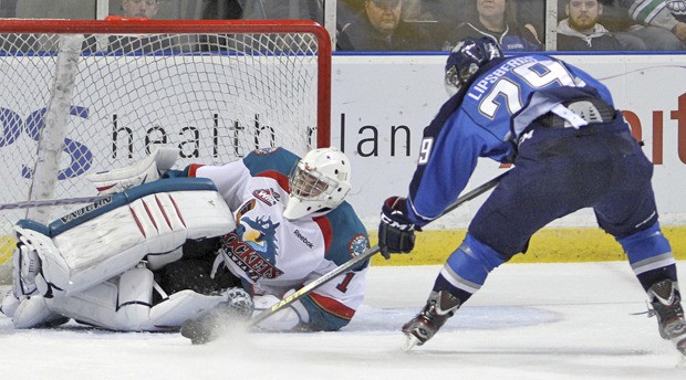The Thunderbirds' Roberts Lipsbergs fires a shot at Kelowna goalie Jackson Whistle during a December game. Lipsbergs is second on the team in scoring with 32 points on 17 goals and 15 assists.