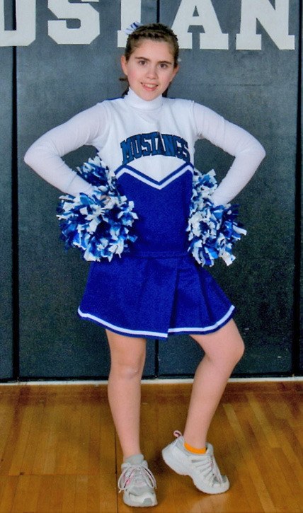Kent's Rachel Jones shows her school spirit as a cheerleader at Rainier Christian Middle School.