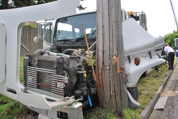 A flatbed truck crashed into a power pole at about 8:45 a.m. Thursday in the 9600 block of South 240th Street in Kent. The driver suffered non-life threatening injuries. The cause of the crash remains under investigation by Kent Police.