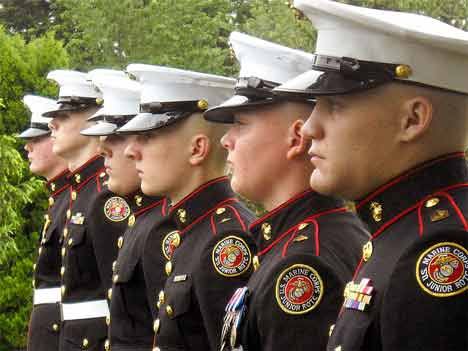 Members of the Kentwood ROTC  program stand at attention Monday