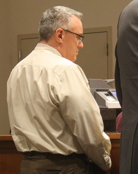 Kevin L. Baker enters a not guilty plea on Monday to 14 counts of theft from the Kent Little League during his role as treasurer of the organization.