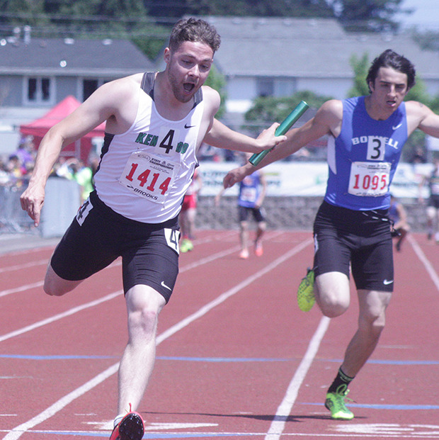 Kentwood's Bailey Paladin anchors his 400-meter relay team to a second-place effort at the state meet Saturday.