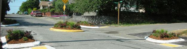 The city of Kent proposes to install traffic circles along Southeast 223rd Drive similar to these installed in 2010 at the intersection of Jason Avenue and Temperance Street to slow vehicles.