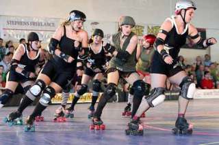 The Seattle-based Rat City Rollergirls compete Saturday at the ShoWare Center. From left to right are Billie Boilermaker