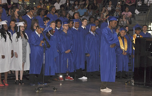 The Kent-Meridian High School choir performs at graduation last June.