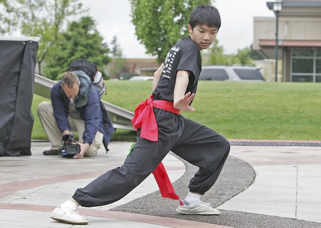 Alex Huang of South Puget Sound Chinese School performs a  sword dance