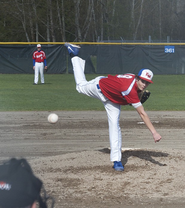 Kent-Meridian’s Jake Barber fires a pitch Monday against Tahoma. The Bears beat K-M 14-0.