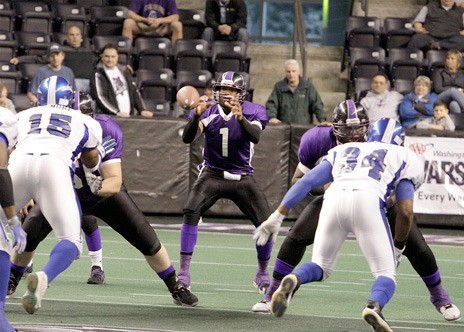 Kent Predators quarterback Charles McCullum takes the snap in an April 30 game against the Billings Outlaws at the ShoWare Center. McCullum is expected to return for the Predators when they open their season Feb. 25.