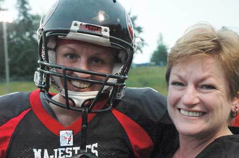 Crystal 'Airforce' Sanderson of the Seattle Majestics shares a smile June 6 with her mom