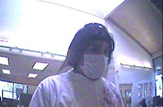 Kent Police are looking for this man in connection with a May 26 bank robbery.