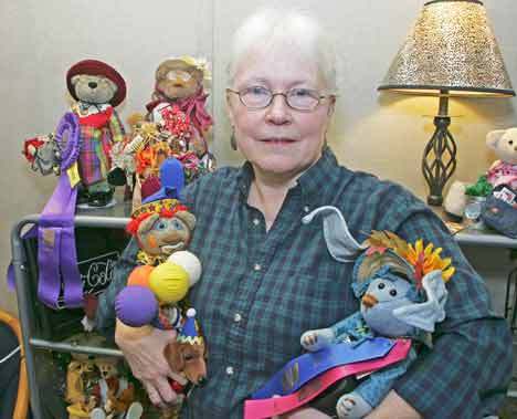 Julia Lewis will be a vendor at this year’s Holiday Bazaar at Kent Commons.  Lewis poses with her hand-crafted teddy bears Nov. 20.  She will have her bears for sale and display at the bazaar.