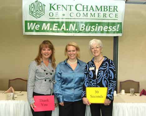 Kent Chamber of Commerce staff smile before the organization's Sept. 2 candidate forum. They are