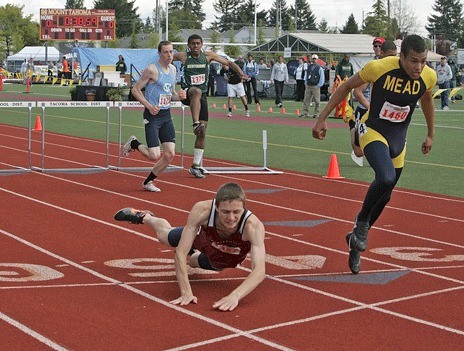 The dive from Kentlake hurdler Shad Hall came up just a little bit short against Mead’s Wes Bailey during the Class 4A state track & field meet at Mount Tahoma High two weeks ago. Despite finishing just a whisker shy of capturing the state title