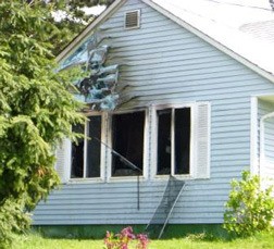 Fire melts siding Friday at a SeaTac house in the 19000 block of 32nd Avenue South.