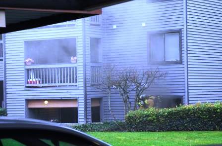 Kent Fire extinguished an apartment fire while Kent Police handcuffed and arrested the barricaded occupant.