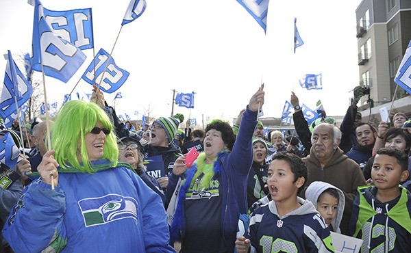 Hundreds of 12s turned out for a Blue Friday rally at Kent Town Plaza to show their support for the Seahawks.