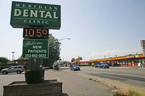 A temperature gauge at Meridian Dental Clinic on Smith Street in the Kent Valley registers 105 degrees at 2:52 p.m. Wednesday.