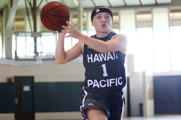 Kylie Huerta plans to take her skills from Hawaii Pacific University to the Harlem Globetrotters. She helped Kentwood High win the 2009 Class 4A state girls basketball title.