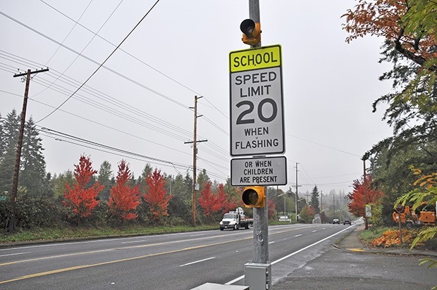 A new speed limit sign occupies the school zone at Carriage Crest Elementary.