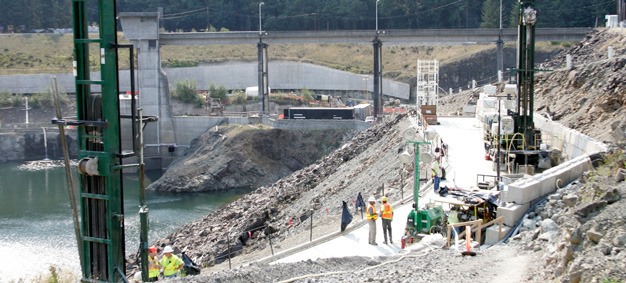 Crews work in 2009 to repair a damaged abutment next to the Howard Hanson Dam.