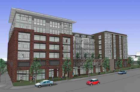 A rendering shows what a developer Robert Slattery’s proposed six-to-seven-story apartment complex might look like at the north side of East Smith Street between Clark and Jason Streets. The project could be eligible for the city’s proposed property-tax waiver of eight years.