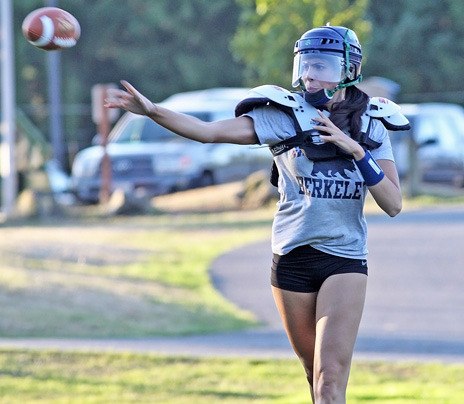 Seattle Mist quarterback Angela Rypien participates in a drill at a recent practice for the Kent-based team of the Lingerie Football League.