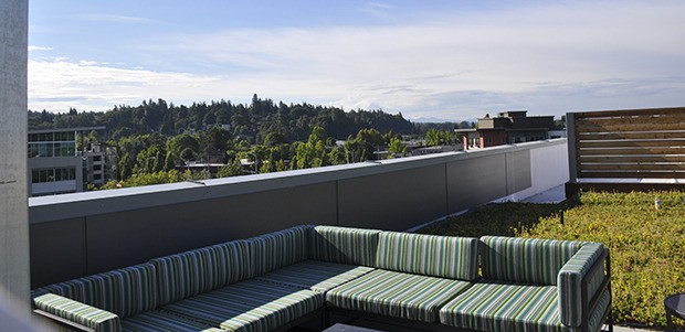 Residents at Dwell at Kent Station can use a rooftop deck that looks south toward Mount Rainier. The new apartment complex opened last month.