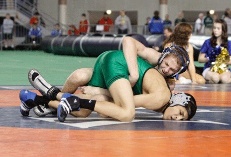 Defending state champion Ruben Navejas (green) wasn't able to repeat
