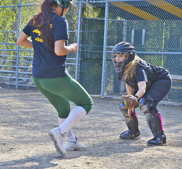 Kentridge catcher Chloe Meier prepares to tag a runner at a recent practice. The Chargers are a contender for the SPSL North title this season. They placed second last year.