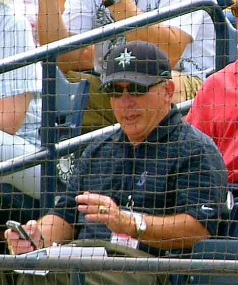 Mariners’ General Manager Jack Zduriencik sits with stopwatch at ready during spring training this month