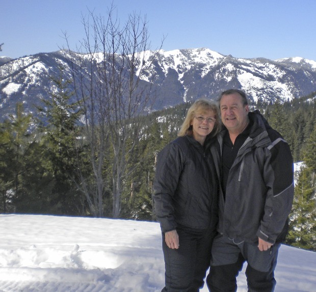 Don Frey with wife Teri enjoy snowmobiling in Washington.