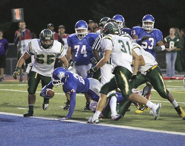Kent-Meridian B.J. Phillips dives in to end a 8 yard touchdown Friday