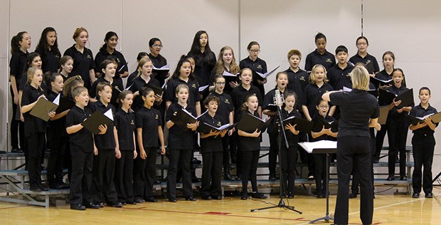The Rainier Youth Choirs' Bella Voce and Colla Voce groups performed during the Kentwood High School Choir Boosters Holiday Boutique on Nov. 15.