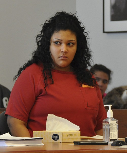 Tatiana Wood-Sims sits in court on Friday during a sentencing hearing in the 2013 beating death of Latasha Walker. Wood-Sims was sentenced to 14 1/2 years in prison for second-degree murder.