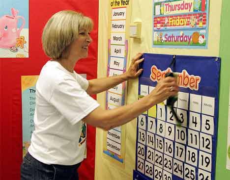 Neely O'Brien kindergarten teacher Marilyn Tullis gets her room prepped for school last fall