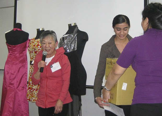 Harleen Kaur receives her first-place prizes at the Fashion Construction Contest.