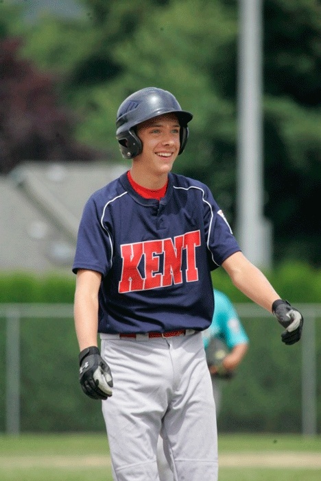 Kent's Austin Benson has reason to smile. Benson and the Kent Seniors Little League All-Star team