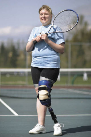 Kent-Meridian senior Victoria Zimmerman lost her left leg in January 2007 when she was struck by a car. She returned to the Royals’ tennis team this spring with a prosthetic leg specially designed for the physical demands of the sport
