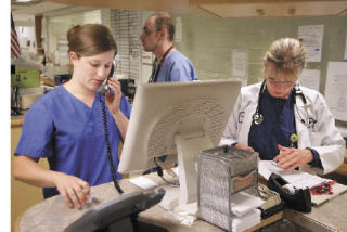 Nurses and doctors work at the nurses’ station in the ER at Valley Medical Center on July 2. Children attending VMC’s Safety Camp Aug. 30 will get a chance to tour the emergency department and see the nursing staff at work. This is the fourth year for the program