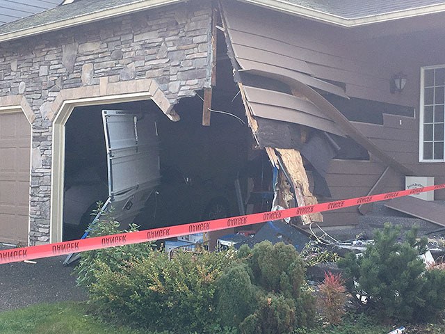A pickup truck damaged a home in the 26800 block of 118th Court Southeast on Friday in Kent. The truck ended up in the driveway of another home.